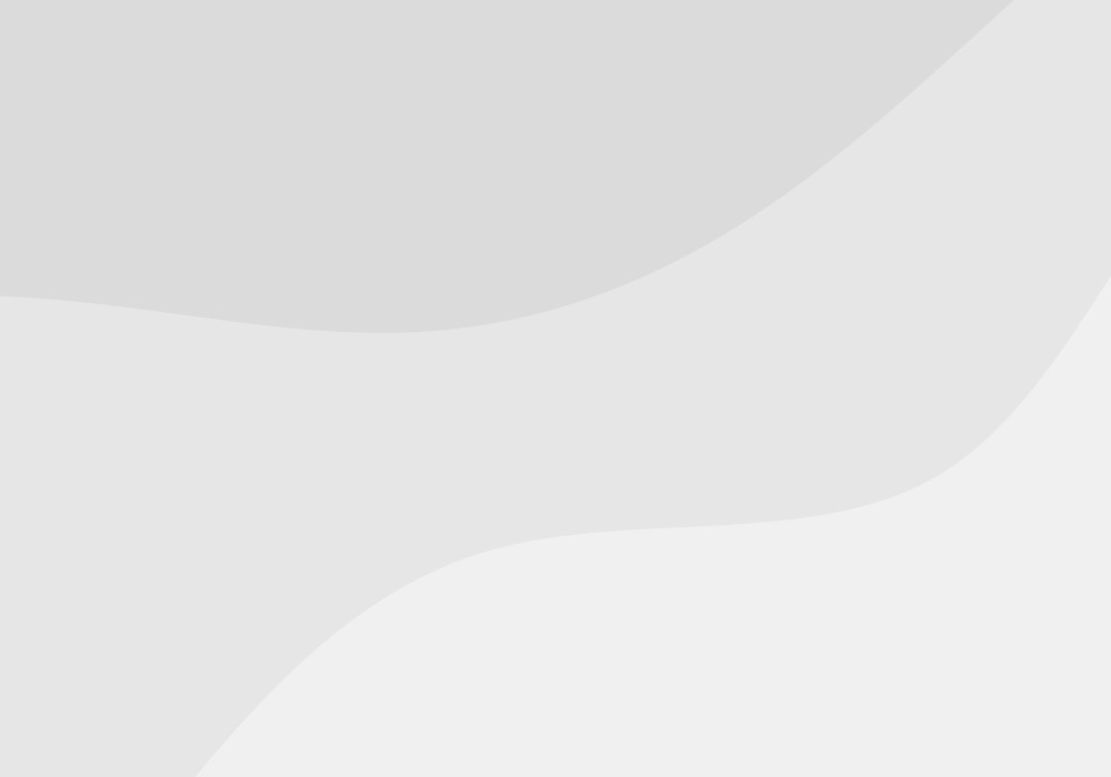 The exterior of a drug store with a car parked in front of it.