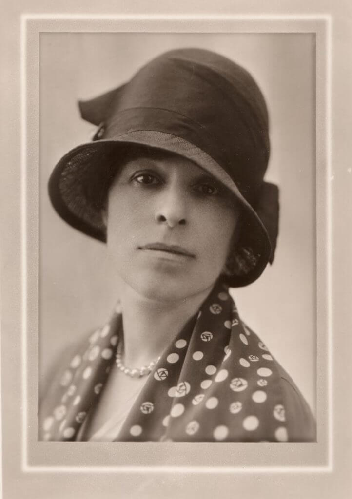 Eva Whiting White in one of her characteristic hats
