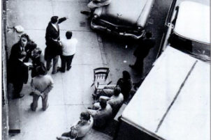 Elizabeth Blood sitting on her car