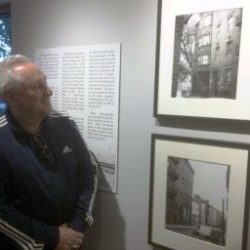 Ira Tarlin viewing Under the Wrecking Ball exhibit