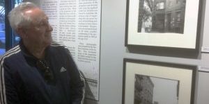 Ira Tarlin viewing Under the Wrecking Ball exhibit