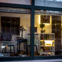 A window display of a set piece livingroom