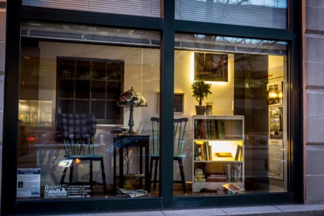 A window display of a set piece livingroom