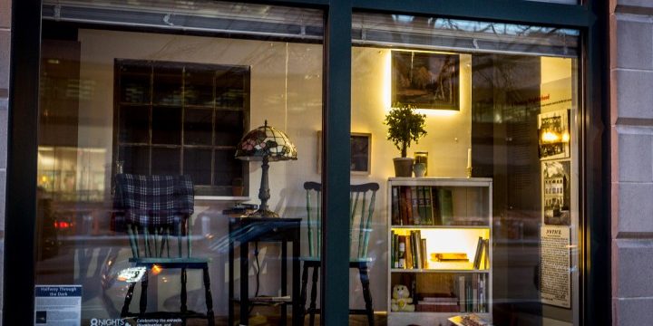 A window display of a set piece livingroom