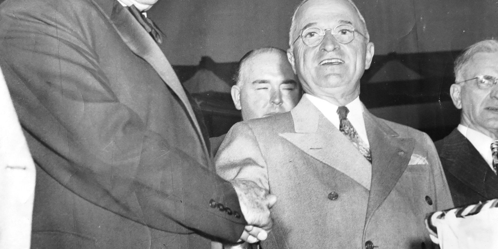 Mayor Curley & President Truman Two men (James Michael Curley and President Truman) in suits shaking hands