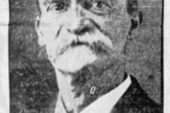 Portrait of an elderly man with a prominent moustache