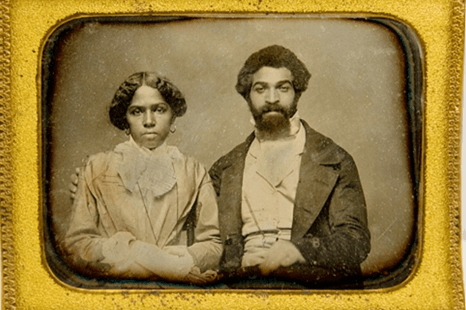 A married couple in fine clothing