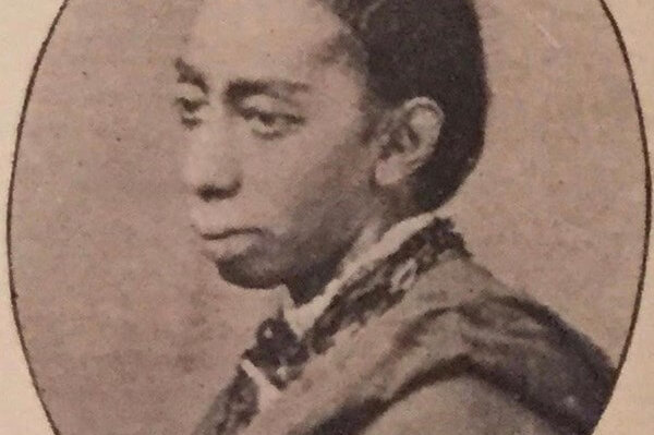 e_gardner_portrait(NPS) Photograph of a woman sitting in profile with her hair tied back.