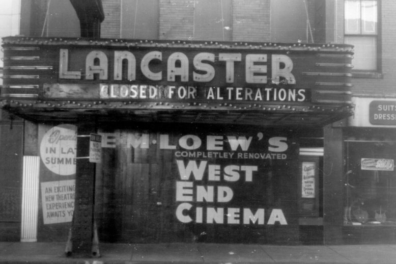 lancaster Photograph of the front of a movie theater with a lighted sign which says Lancaster: Closed for alterations.