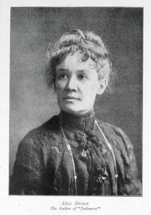 A black and white photograph of a woman in a victorian dress. The photos is labelled "Alice Brown."