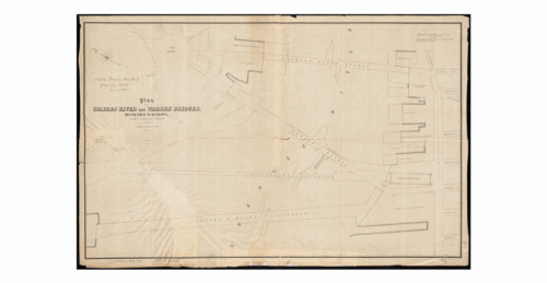 A paper map showing an arial view of several bridges and wharfs over a river between two cities.
