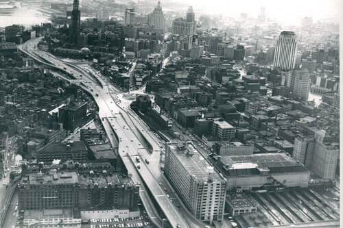 Completed Central Artery, 1959-1964, (City of Boston Archives). An aerial view of Boston and the central artery.
