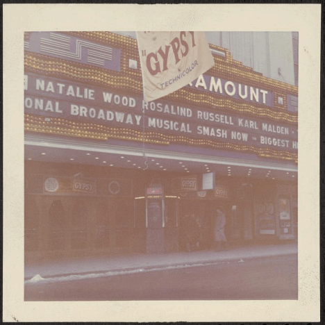 A movie theater marquee with the names of stars and a banner for the movie "gypsy".