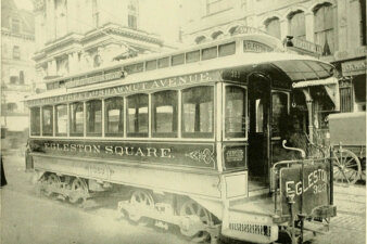 West End Street Railway streetcar on Tremont Street,1892. An electrified trolly car on a street.