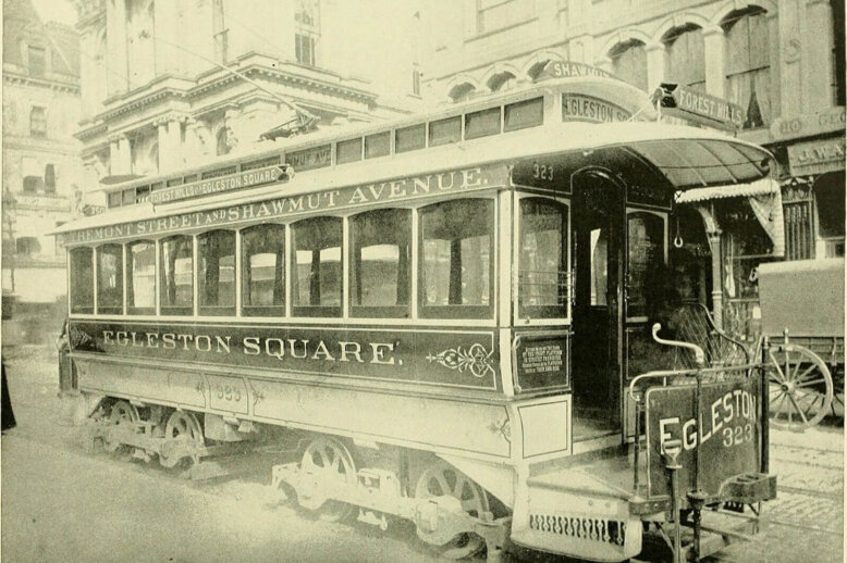 West End Street Railway streetcar on Tremont Street,1892. An electrified trolly car on a street.