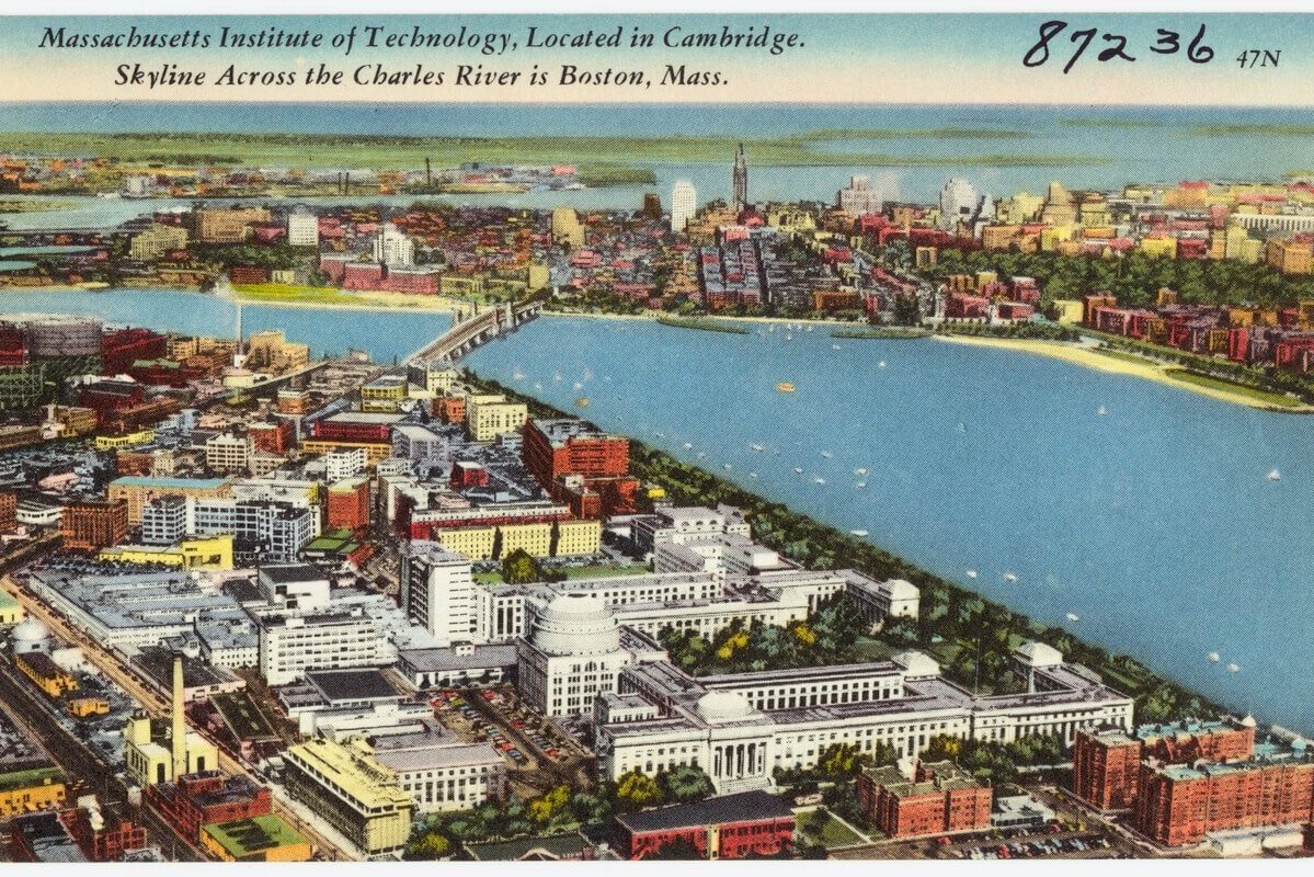 An illustration of a city along a river with a large complex in the lower center and an industrial to the top left.