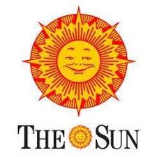 The Lowell Sun logo A sun with a human face over a compass rose.