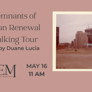 A pink background with an image of a cleared land with a buildings in the background.