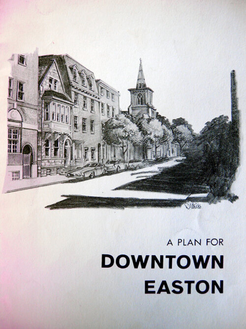 The cover of a report called "A Plan for Downtown Easton." There is an illustration of a quaint main street next to a park.