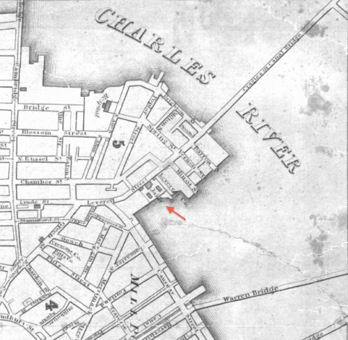 A detail of a map showing a jail at the edge of a waterway marked with a red arrow.