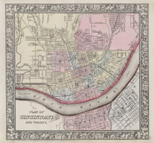 A map of a city on the curve of a river. The area north of the city has 16 wards colored in.