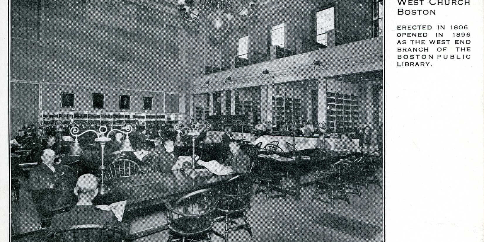 Postcard_Old_West_Church_Library_c.1900s(LOP008)(WEM) A black and white postcard showing a reading room in a library. There is a balcony above.