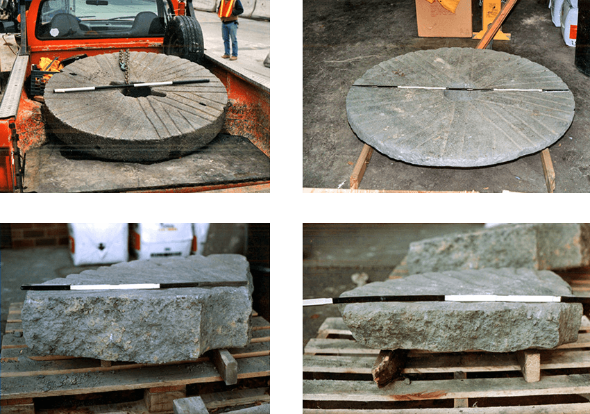 Four images of mill stones with measuring sticks across their middles. The top two are complete circles and the lower two are broken pieces.